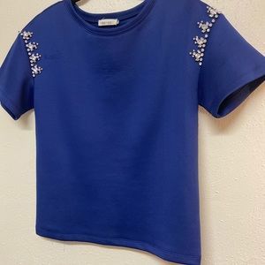 Blue shirt with jewels